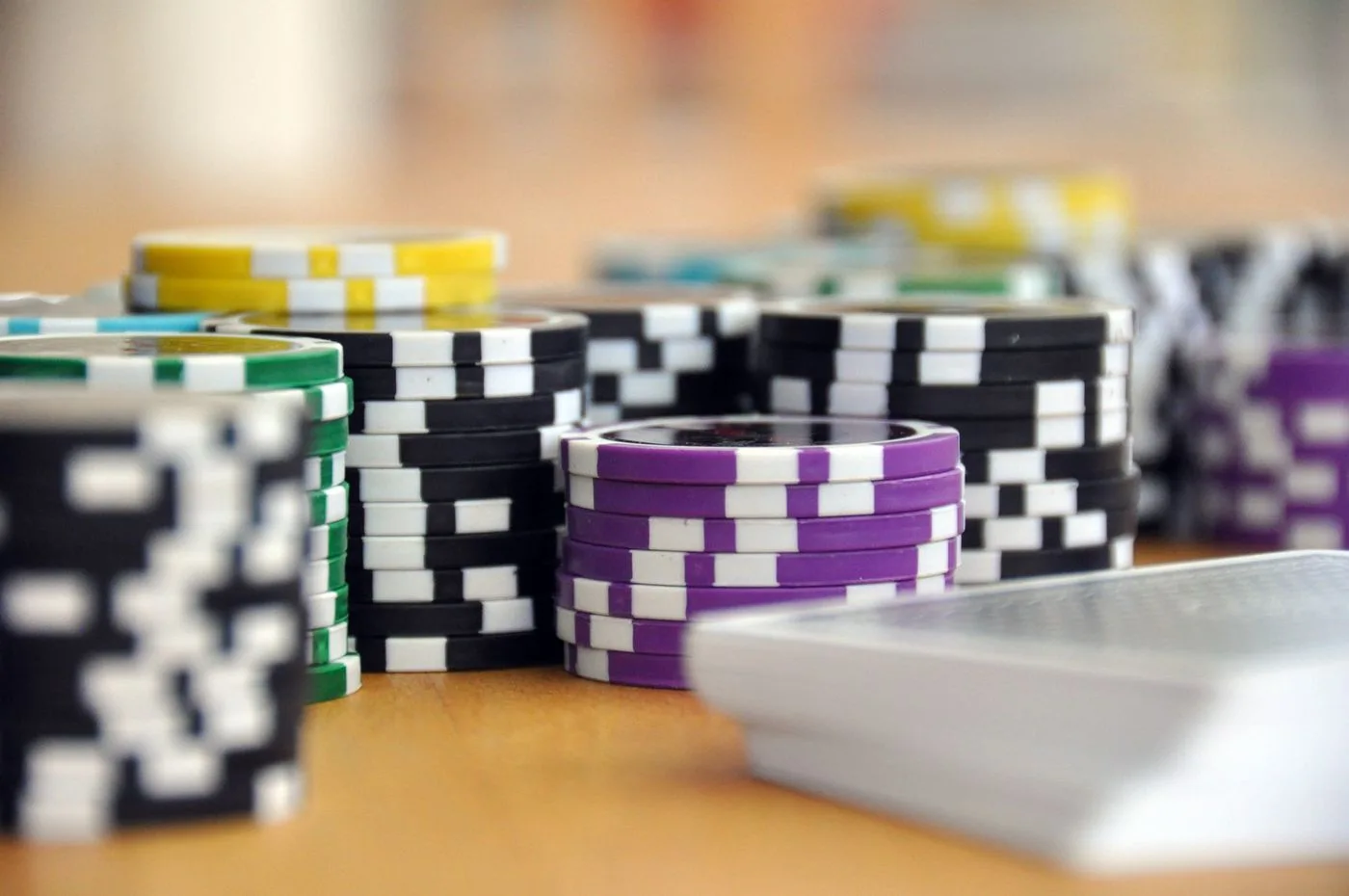 Rows of poker chips arranged on a tabletop