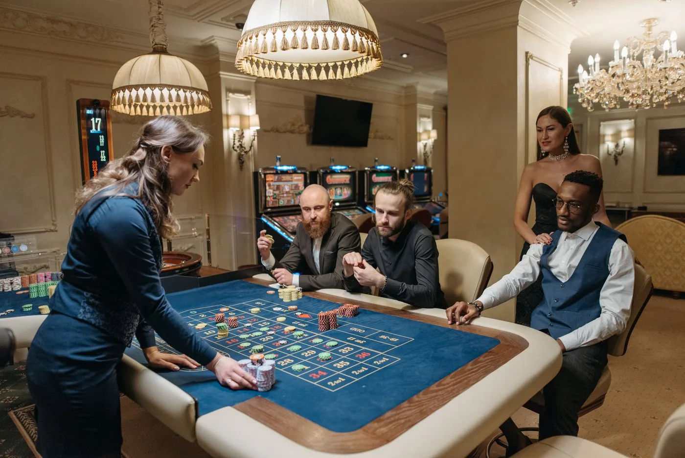 Dealer and players gathered around a table